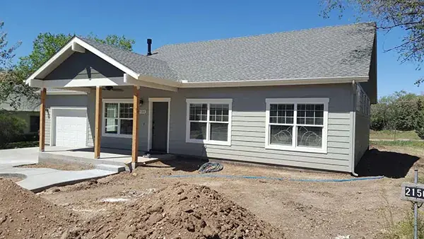 Finished craftsman-style custom home with covered porch in Northern Arizona