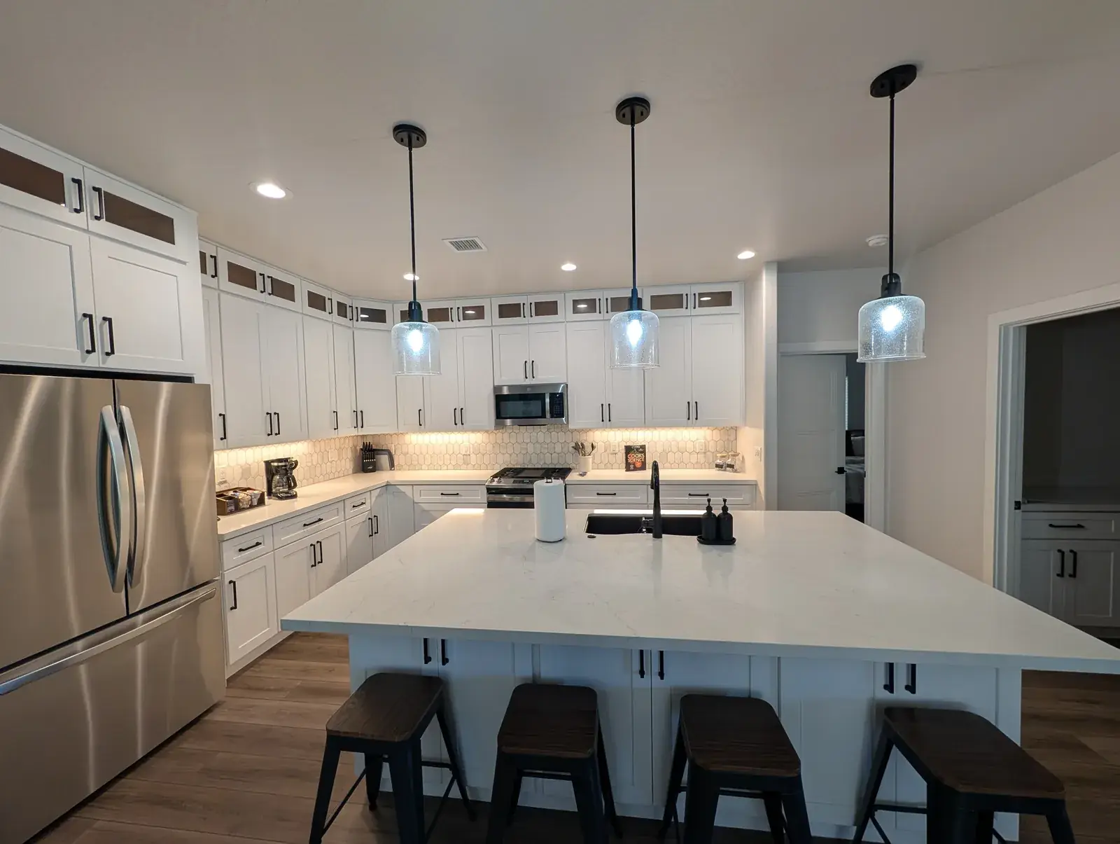 Open-concept kitchen and dining area in a custom Northern Arizona home