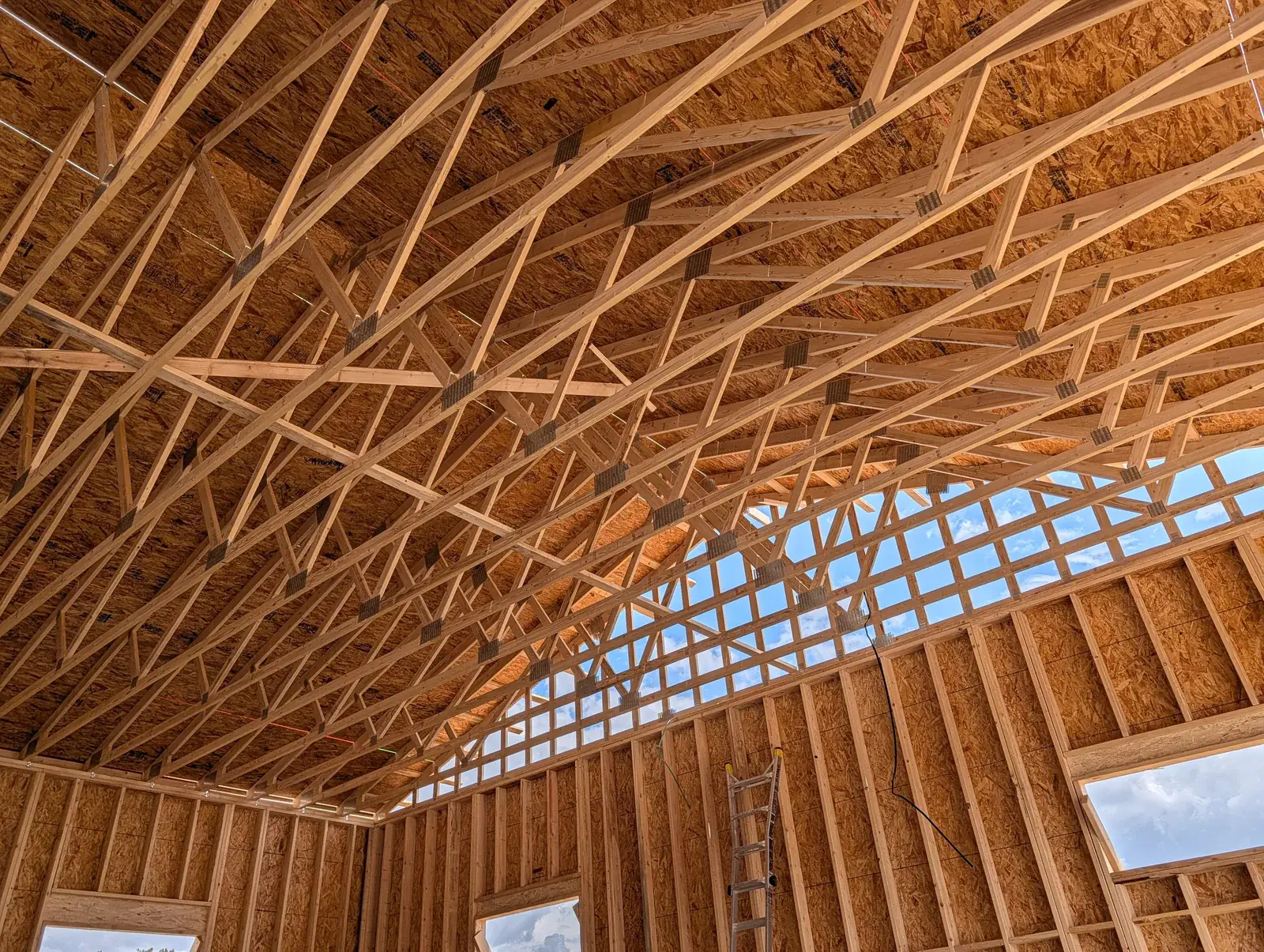 Roof truss framing on a custom home under construction